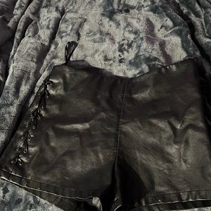 Black leather shorts
